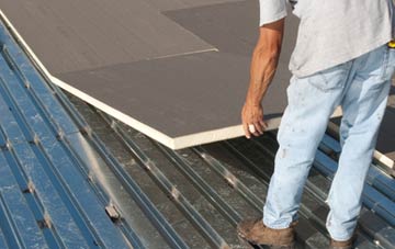 benefits of insulating St Giles In The Wood flat roofing